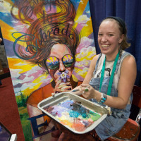 Elena Gunderson creating her beautiful, Colorado inspired painting. 