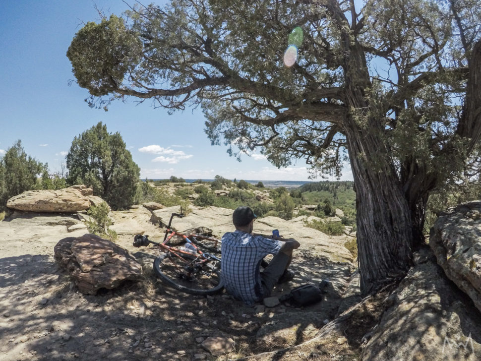 Mitch Kline enjoying a mid-ride non-alcoholic CERIA Indiewave IPA at Hidden Mesa Park near Castle Rock, CO