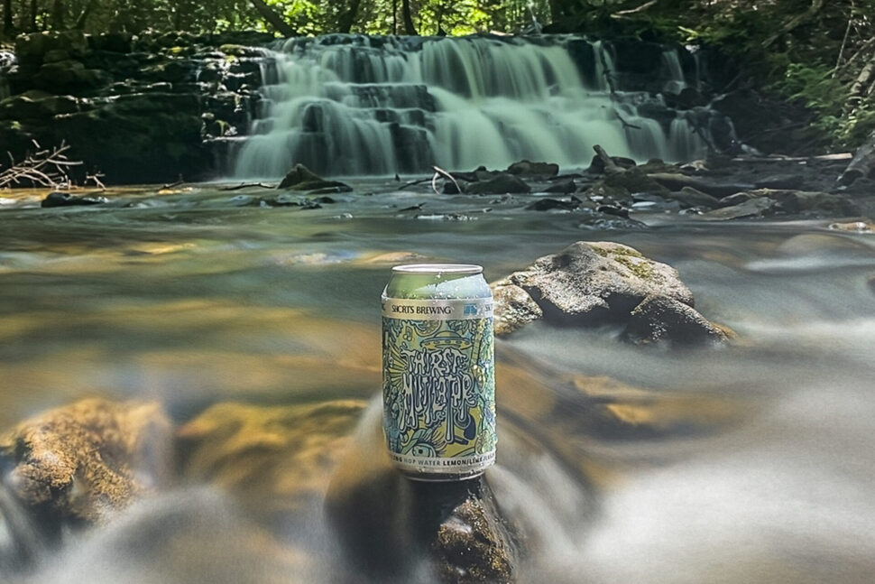 Billy Strings x Short's Brewing Thirst Mutilator in Pictured Rocks National Lakestore. Photo by Mitch Kline.